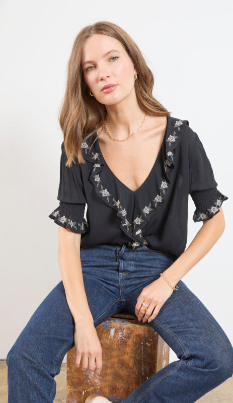 EMBROIDERED RUFFLE EDGE SHORT SLEEVE TOP