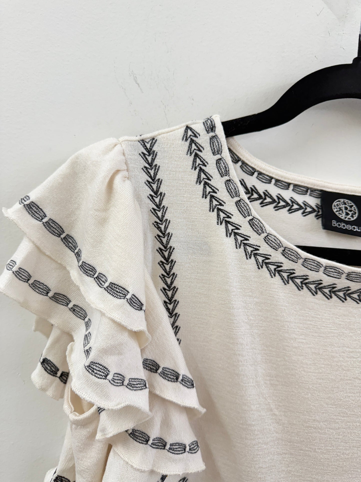 EMBROIDERED RUFFLE EDGE TOP